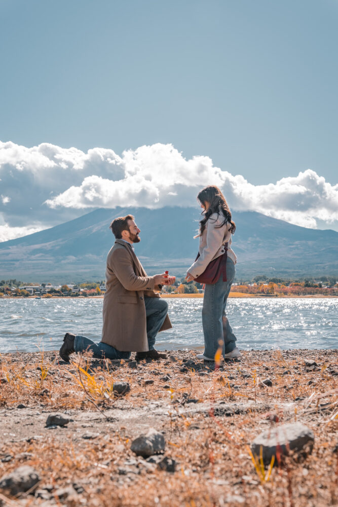 Couple proposal at Lake Kawaguchi with Mt Fuji in background